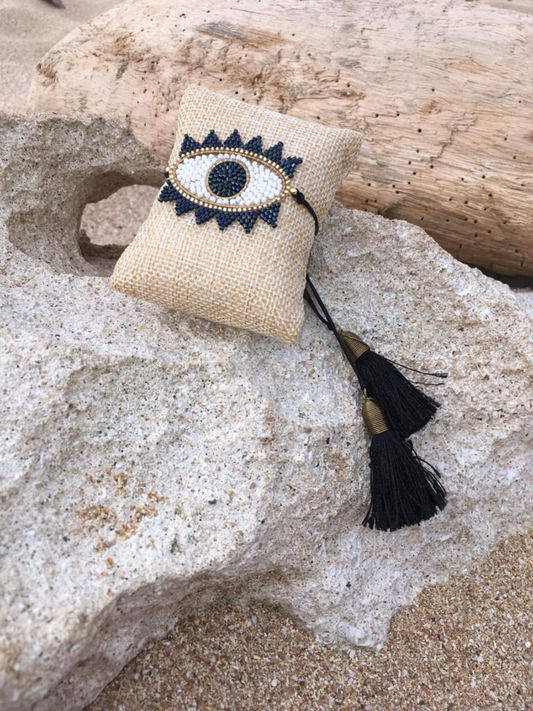 Evil eye cord bracelet with tassels